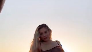 Bethanylilya - bethanylilya wearing my see thru body suit with flames on the edge of the cliff in po
