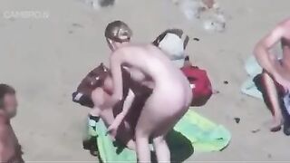 Sharing wife on the beach