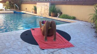 Naked Yoga outside by the pool