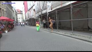 Naked girl walks the streets of the city