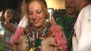 Heather Davis playing with her nipples at Mardi gras