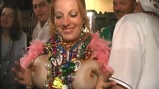 Heather Davis playing with her nipples at Mardi gras