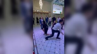 Woman splits dress while dancing