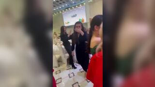 Woman splits dress while dancing